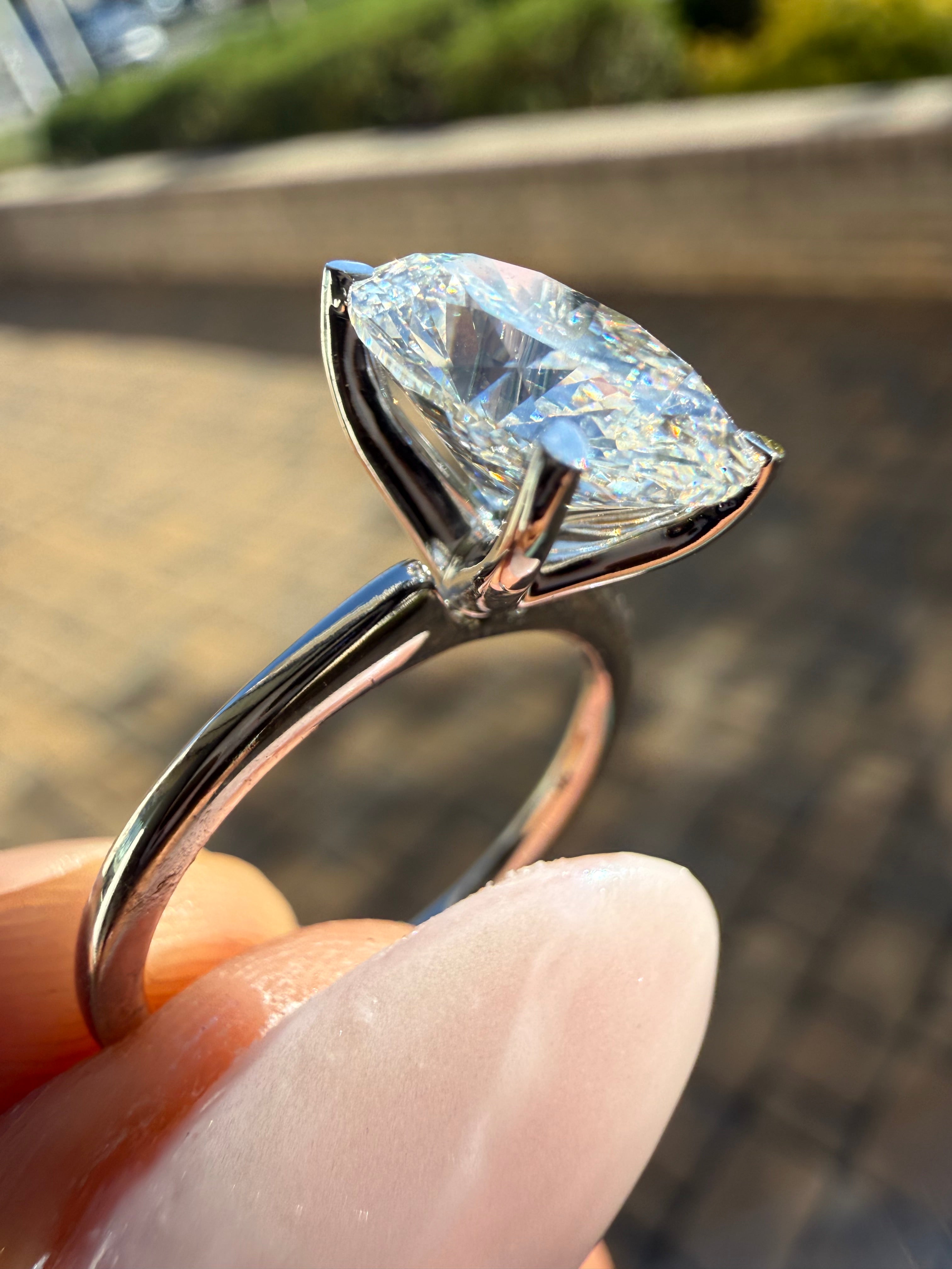 3 carat oval  cut ring cut E vs IGI certified 3 carat center stone with special cut  highly handcrafted in grown diamond 14k gold