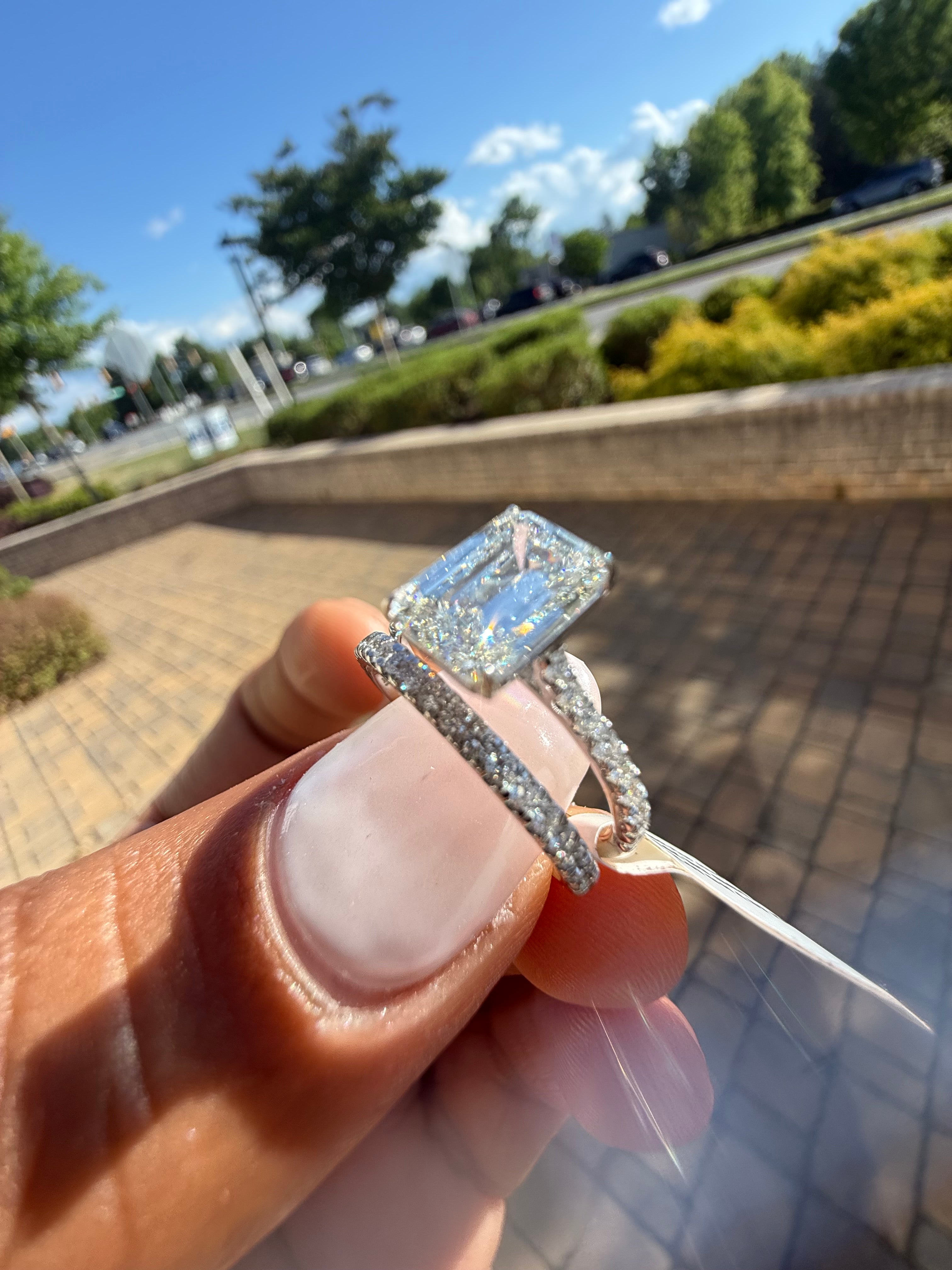 3 carat ring emerald cut ring cut E vs IGI certified 2 carat center stone with special cut side band  on side highly handcrafted in grown diamond 14k gold full engagement set