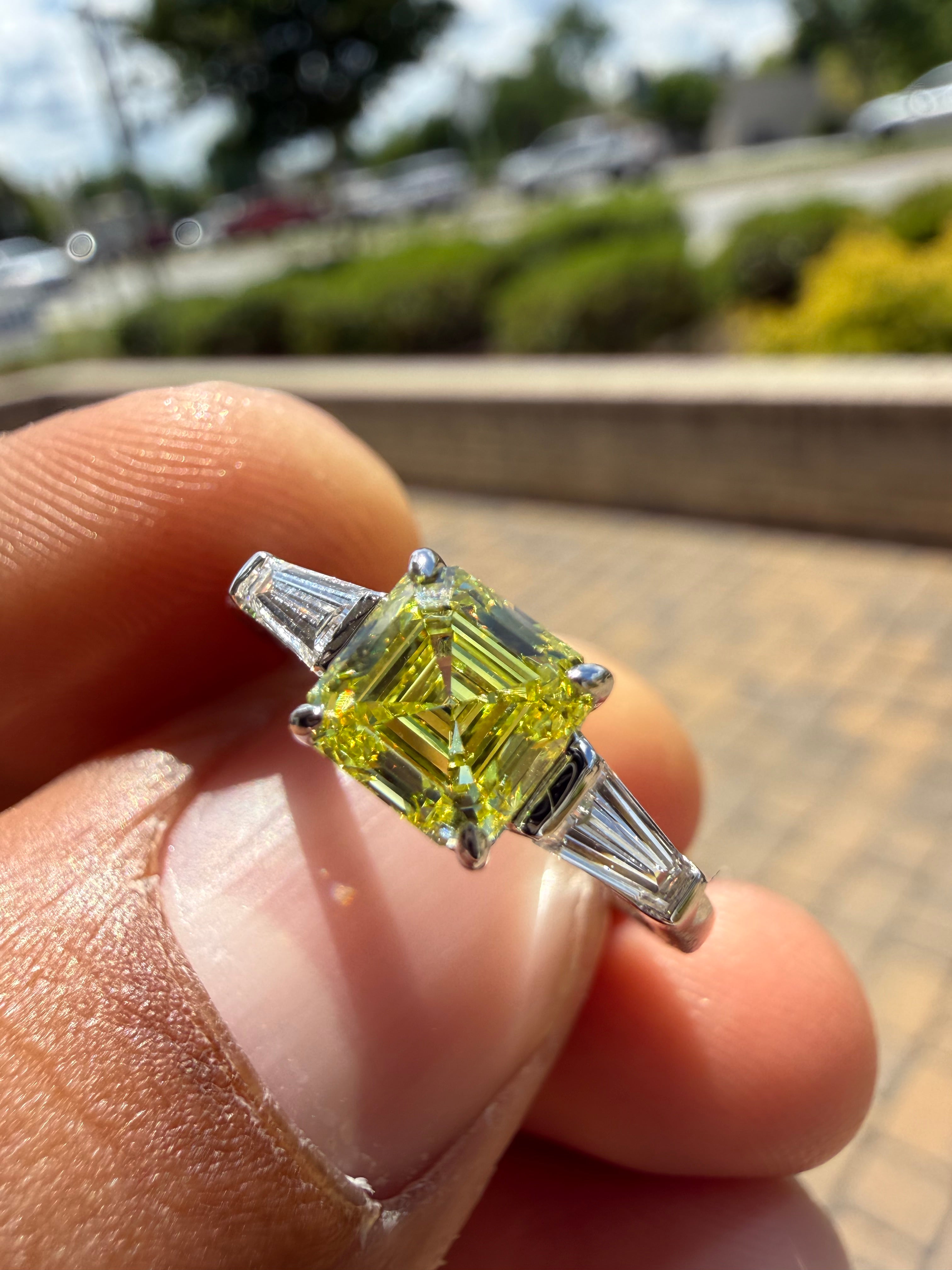 1.30 carat  fancy yellow emerald cut vs ring in fancy vivid yellow igi certified stone handcrafted in color high cut with  handcrafted ring made with 14k gold in grown diamond igi certified