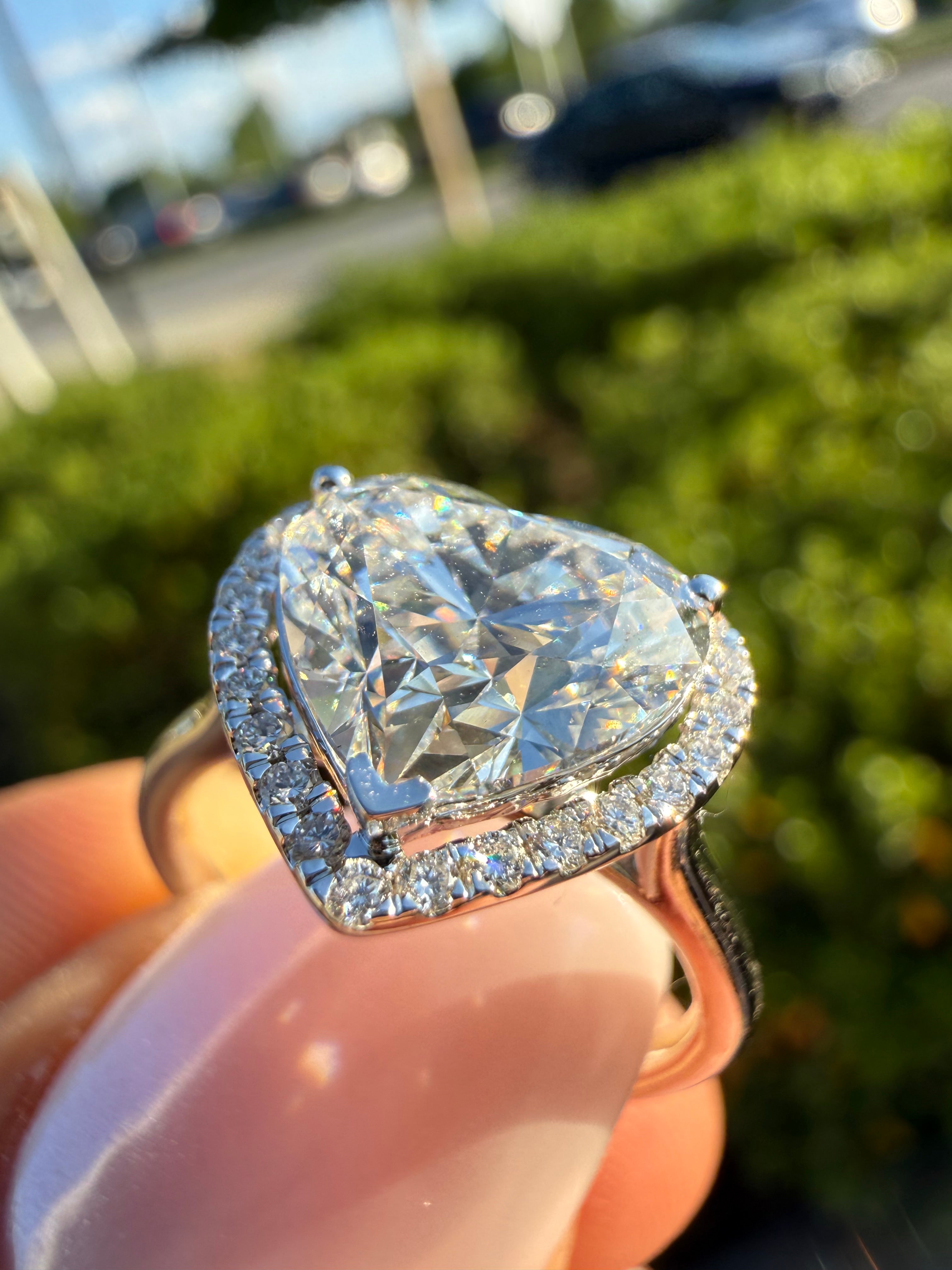 4 carat heart VS  with 3 carat center stone IGI E vs certified with side igi certified special cut ring Vs stone with special stone fancy handcrafted in grown diamond 14k gold ( made in gold ) iGI certified Diamond