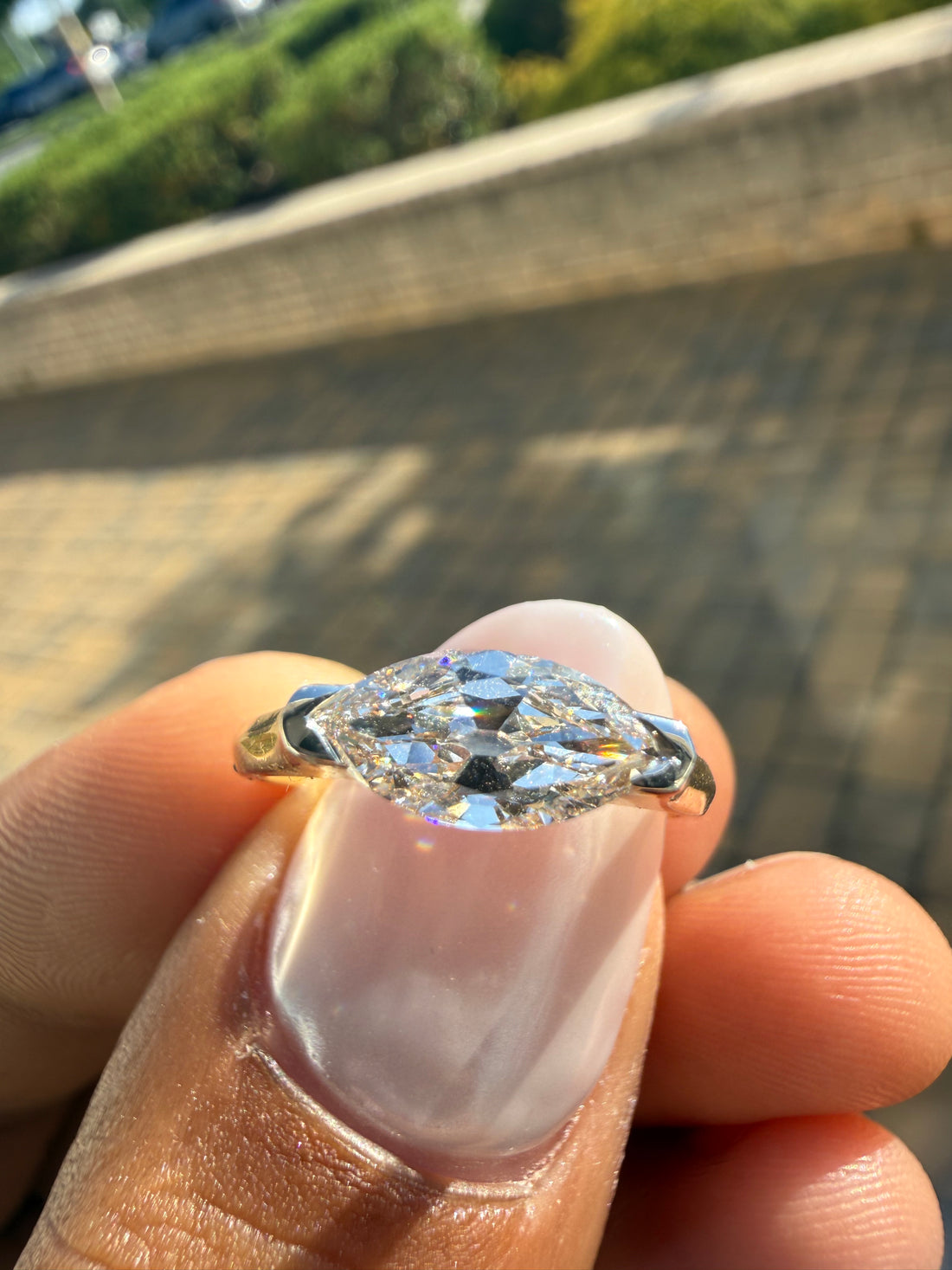 2 carat elongated oval special cut ring cut E vs IGI certified  stone with special cut on side stone highly handcrafted in grown diamond 14k gold