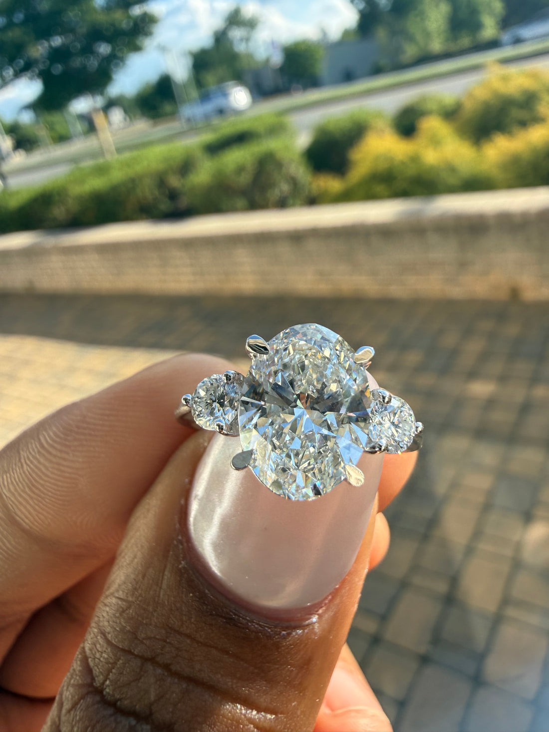 3 carat oval cut ring cut E vs IGI certified 3 carat center stone with special cut on side stone highly handcrafted in grown diamond 14k gold