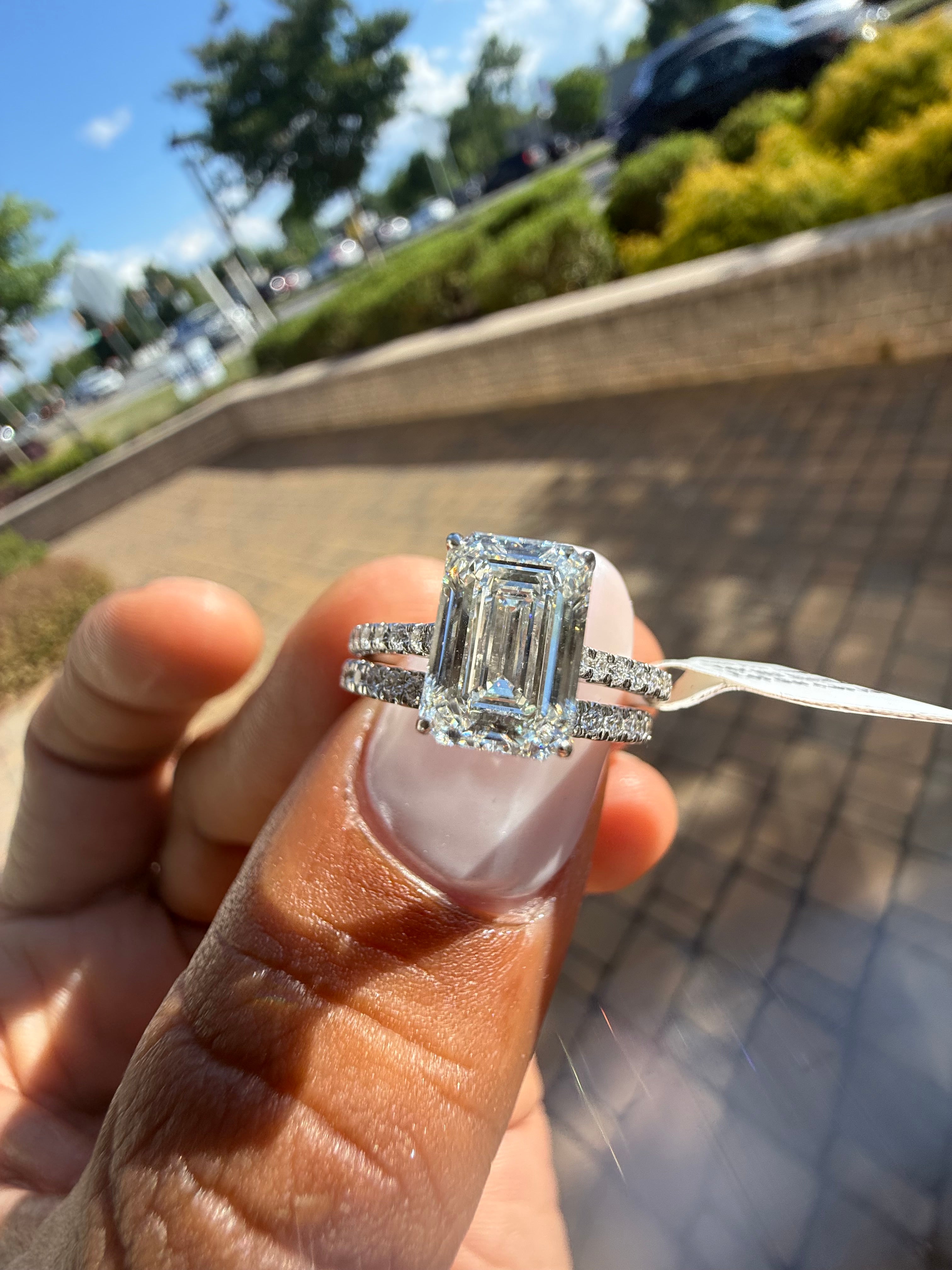 3 carat ring emerald cut ring cut E vs IGI certified 2 carat center stone with special cut side band  on side highly handcrafted in grown diamond 14k gold full engagement set