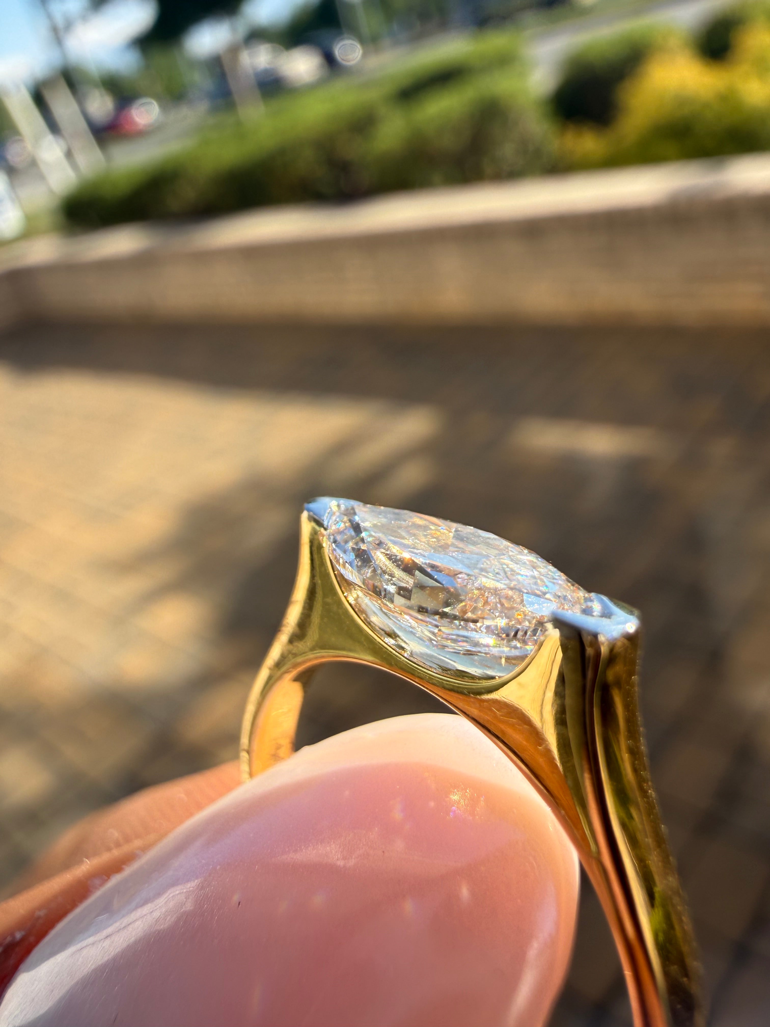 2 carat elongated oval special cut ring cut E vs IGI certified  stone with special cut on side stone highly handcrafted in grown diamond 14k gold