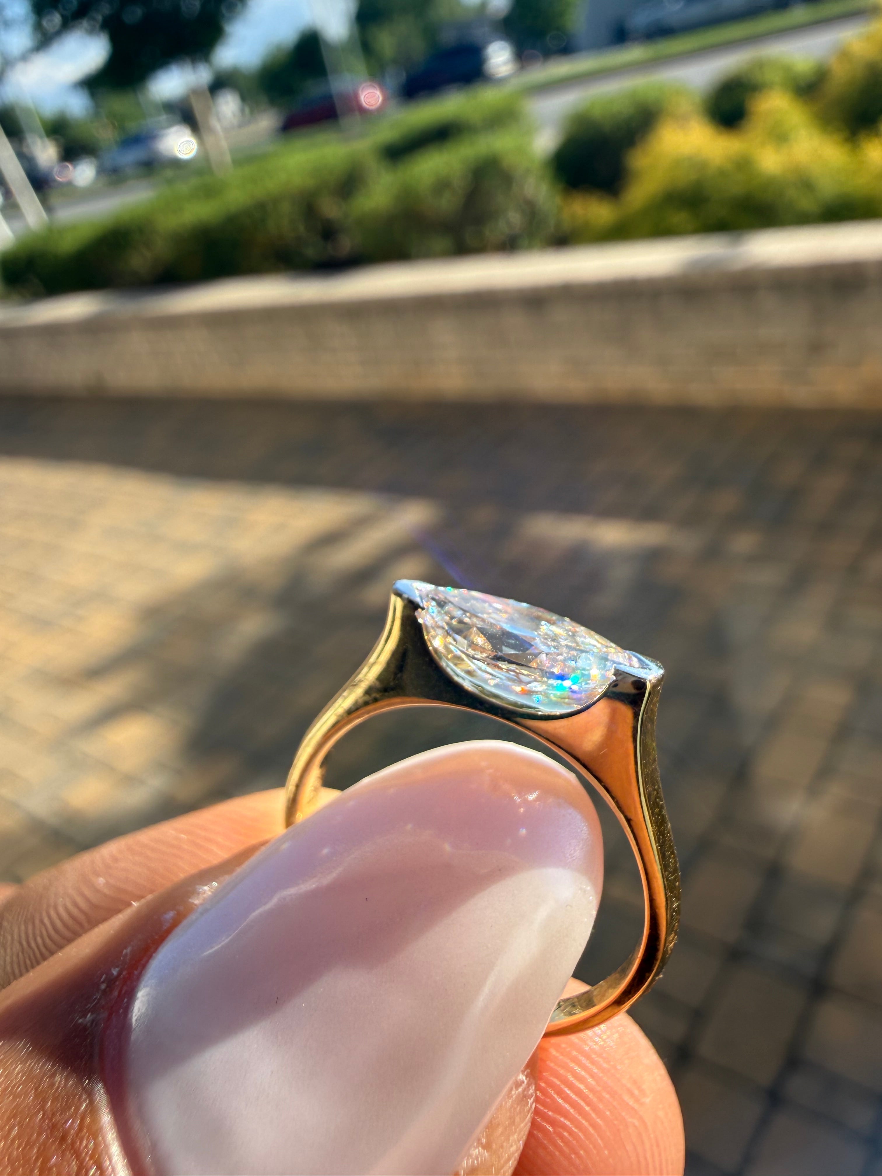 2 carat elongated oval special cut ring cut E vs IGI certified  stone with special cut on side stone highly handcrafted in grown diamond 14k gold