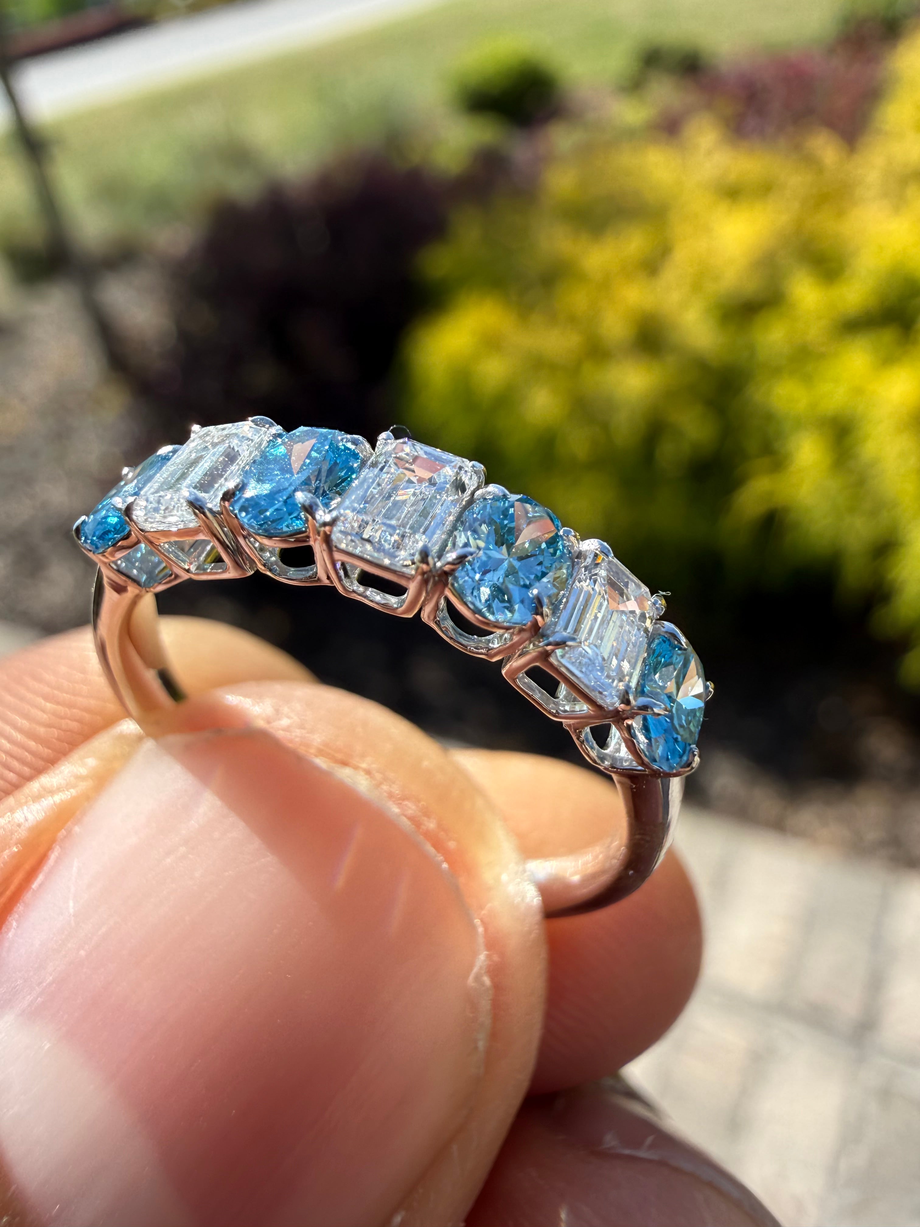 1.5 carat fancy vivid blue oval  E vs and emerald cut handcrafted ring made with 14k gold in grown diamond