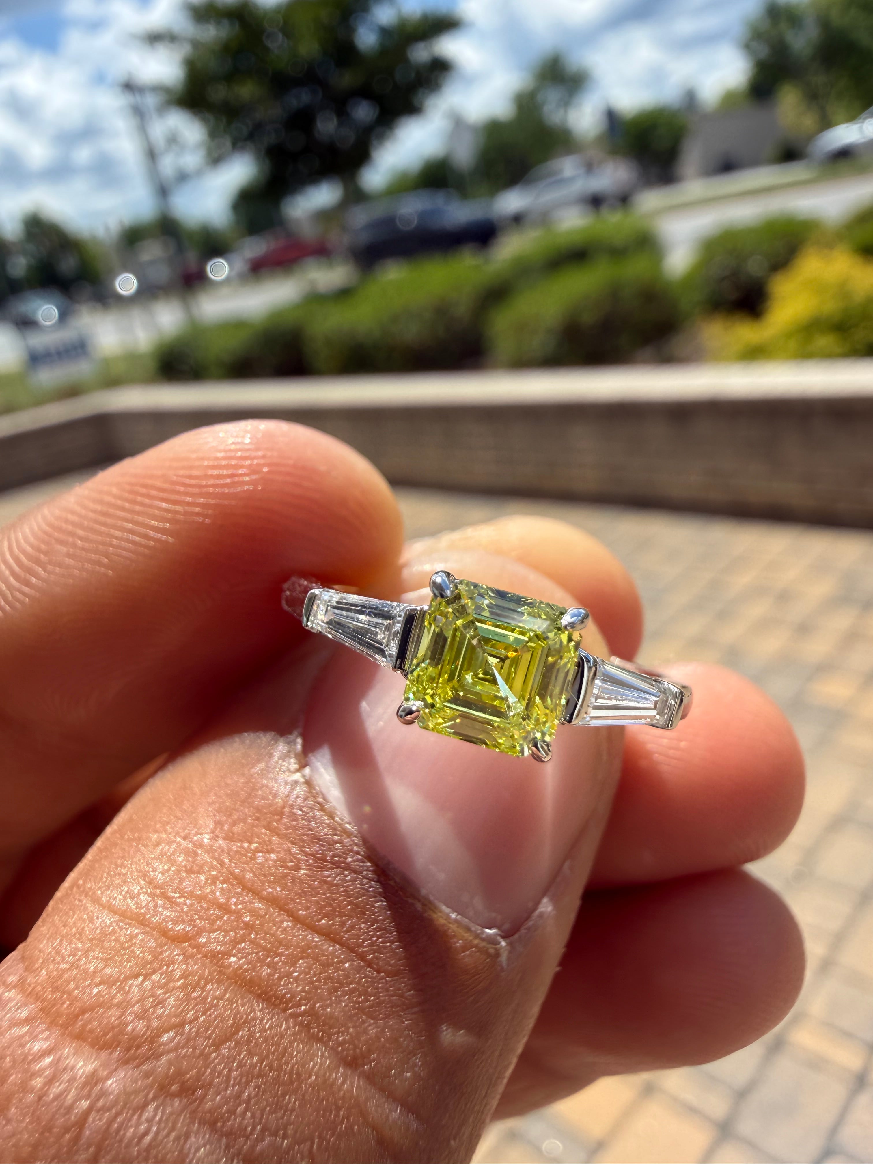 1.30 carat  fancy yellow emerald cut vs ring in fancy vivid yellow igi certified stone handcrafted in color high cut with  handcrafted ring made with 14k gold in grown diamond igi certified