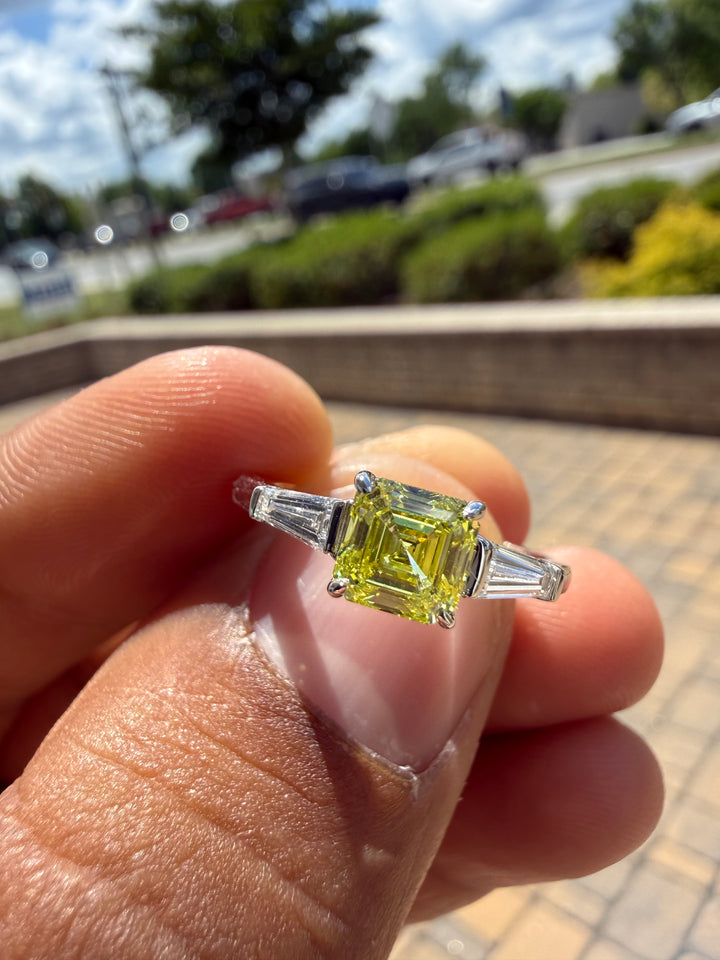 1.30 carat  fancy yellow emerald cut vs ring in fancy vivid yellow igi certified stone handcrafted in color high cut with  handcrafted ring made with 14k gold in grown diamond igi certified