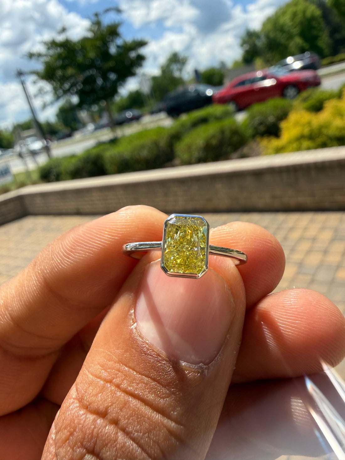 1.30 carat  fancy yellow emerald cut vs ring in fancy vivid yellow igi certified stone handcrafted in color high cut with  handcrafted ring made with 14k gold in grown diamond igi certified