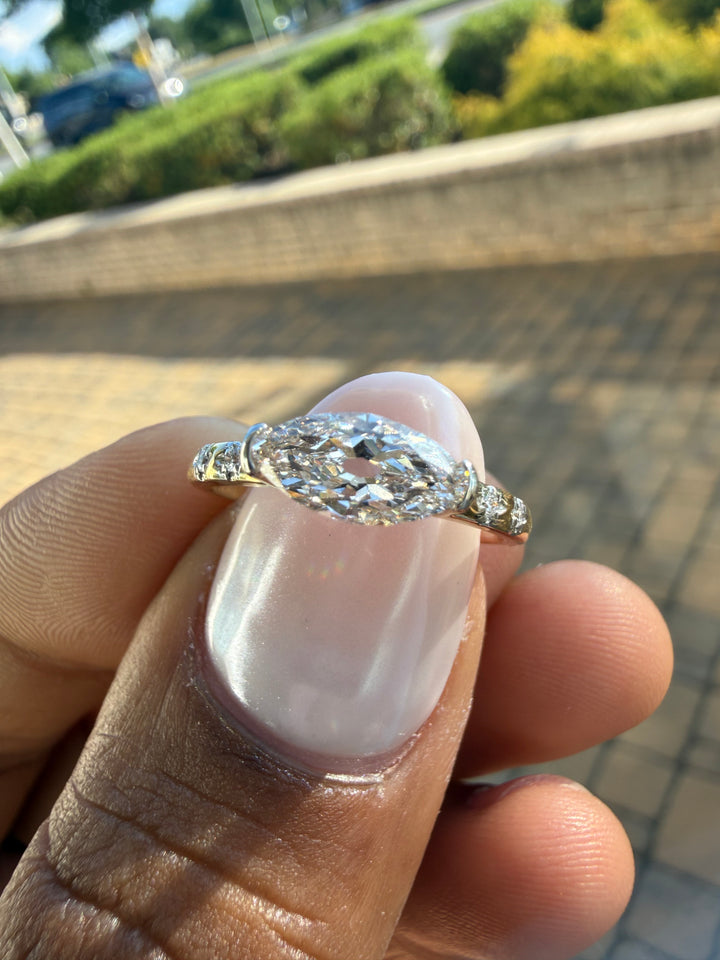 2 carat elongated oval special cut ring cut E vs IGI certified  stone with special cut on side stone highly handcrafted in grown diamond 14k gold