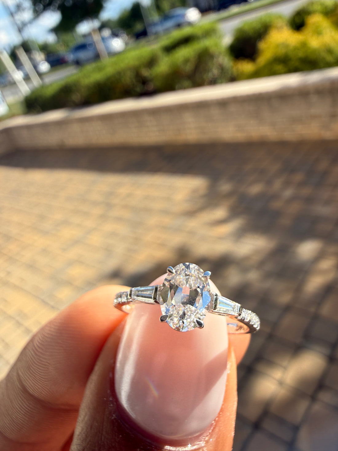 1.5 carat oval cut ring cut E vs IGI certified with special cut baguette on side highly handcrafted in grown diamond 14k gold
