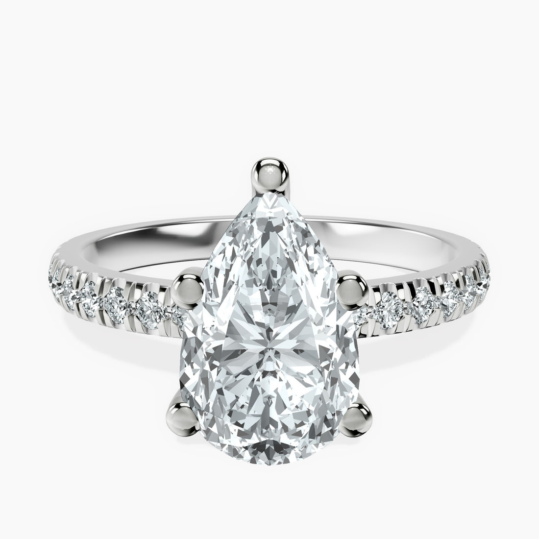 3 carat pear  center  ring  VS1 . Eye Clean stone IGI certified , handcrafted in 14k gold