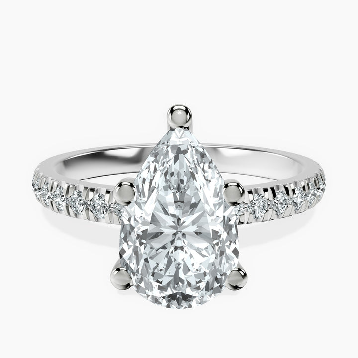 3 carat pear  center  ring  VS1 . Eye Clean stone IGI certified , handcrafted in 14k gold