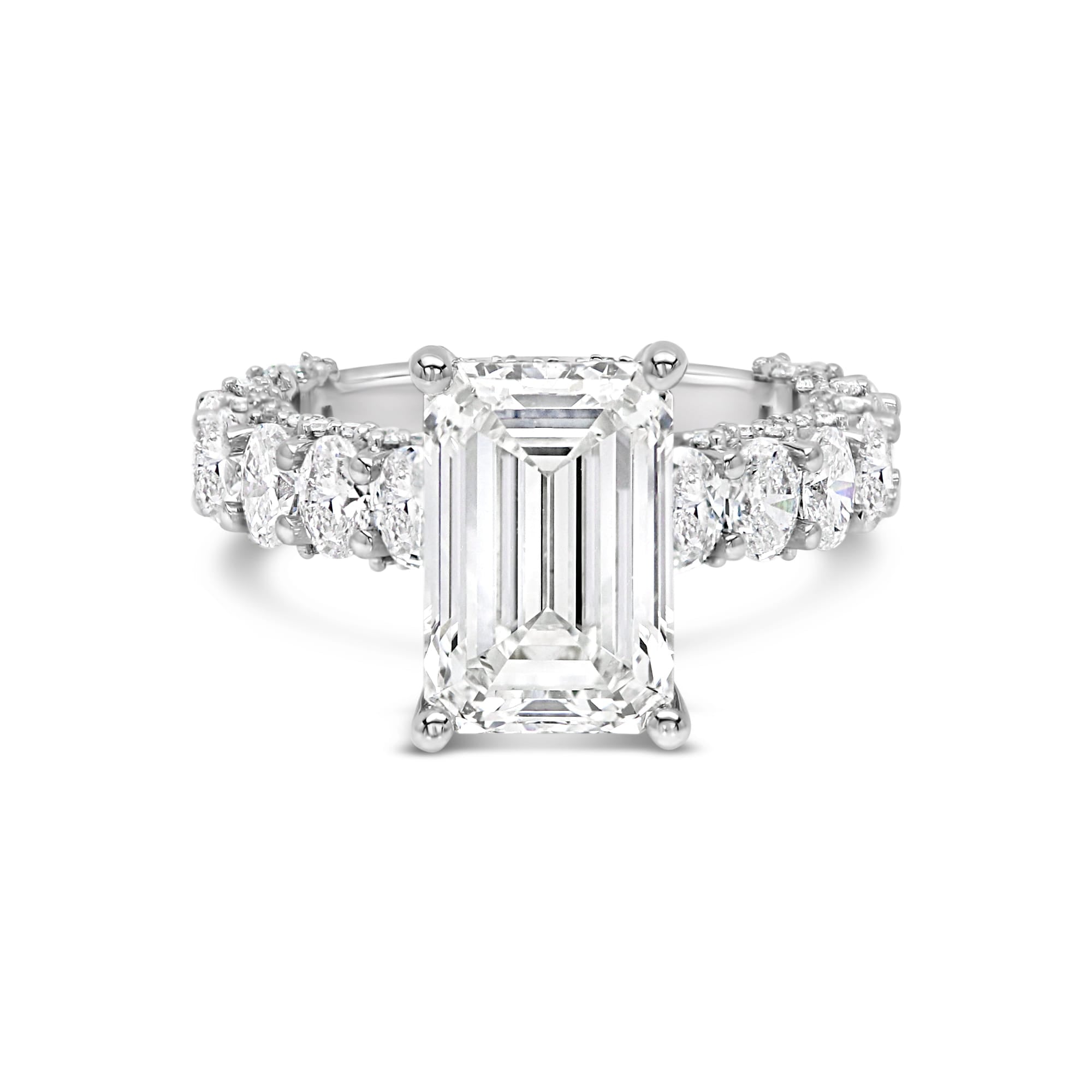 3 carat emerald cut center stone E VS IGi certified engagement ring handcrafted in 14k gold total 6 carat diamond on ring with side fancy shapes oval( made in 14k gold )