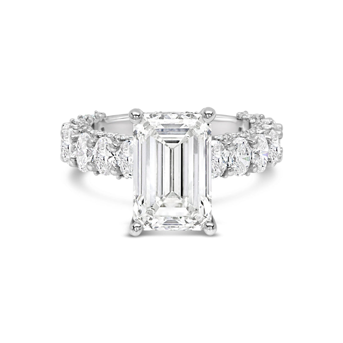 3 carat emerald cut center stone E VS IGi certified engagement ring handcrafted in 14k gold total 6 carat diamond on ring with side fancy shapes oval( made in 14k gold )