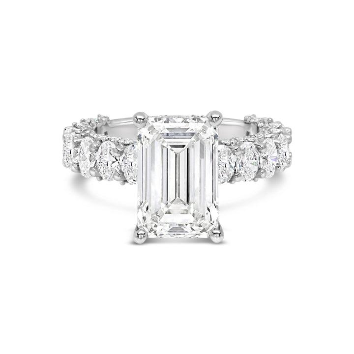 3 carat emerald cut center stone E VS IGi certified engagement ring handcrafted in 14k gold total 6 carat diamond on ring with side fancy shapes oval( made in 14k gold )