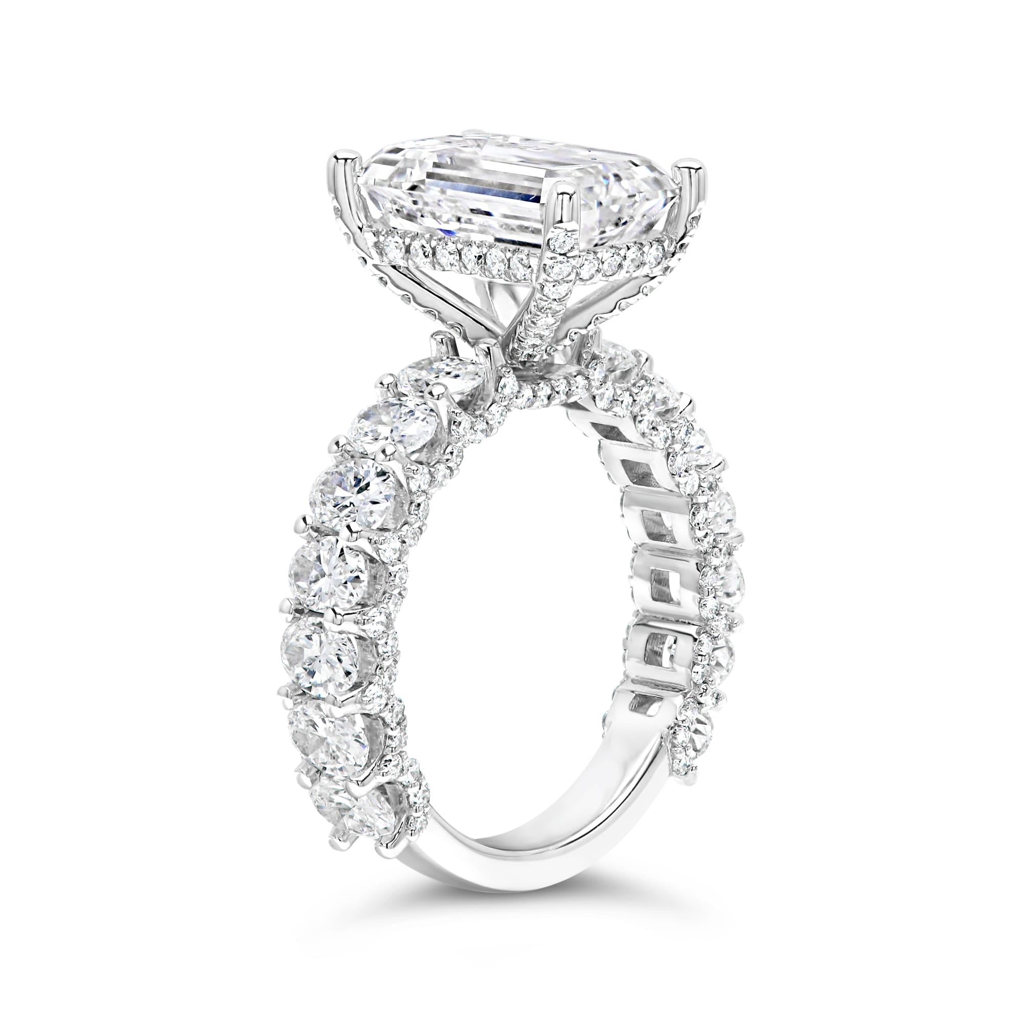 3 carat emerald cut center stone E VS IGi certified engagement ring handcrafted in 14k gold total 6 carat diamond on ring with side fancy shapes oval( made in 14k gold )