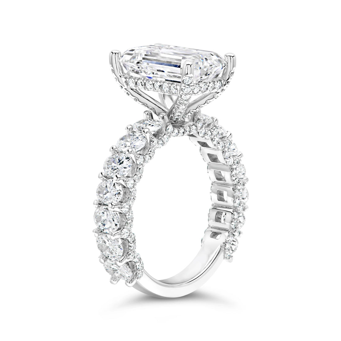 3 carat emerald cut center stone E VS IGi certified engagement ring handcrafted in 14k gold total 6 carat diamond on ring with side fancy shapes oval( made in 14k gold )