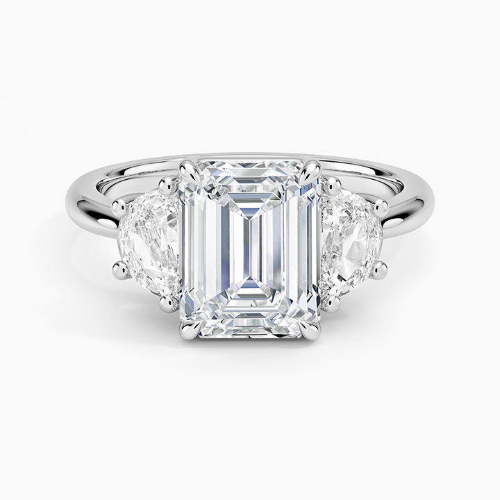 3 carat center stone emerald   EF  VS . With half moon shape diamond on side Excellent cut eye Clean stone IGI certified diamond ,engagement ring handcrafted made in 14k gold