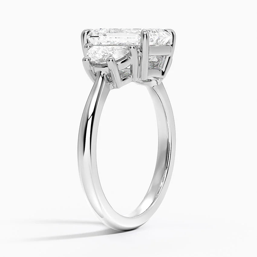 3 carat center stone emerald   EF  VS . With half moon shape diamond on side Excellent cut eye Clean stone IGI certified diamond ,engagement ring handcrafted made in 14k gold