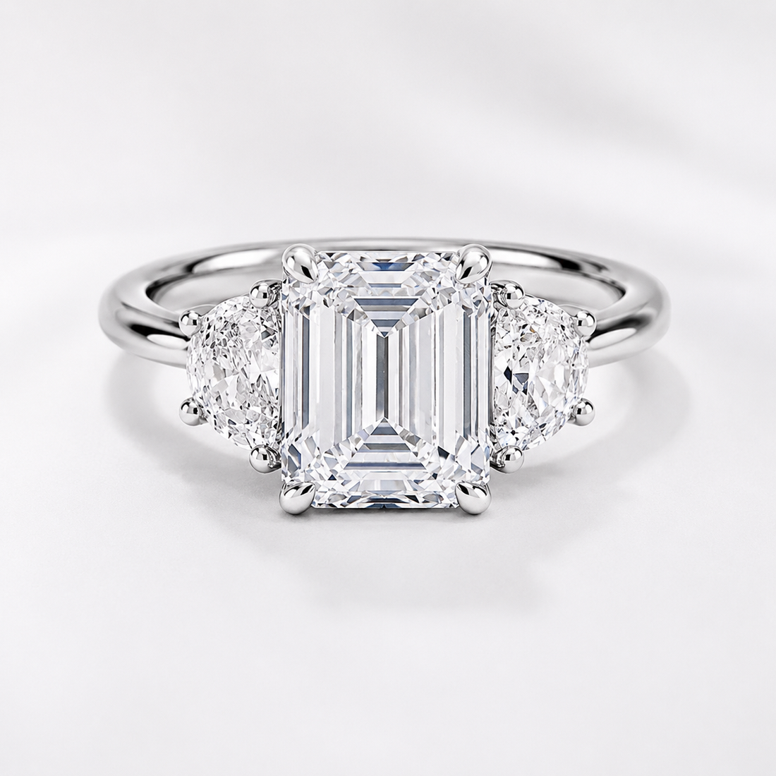 3 carat center stone emerald   EF  VS . With half moon shape diamond on side Excellent cut eye Clean stone IGI certified diamond ,engagement ring handcrafted made in 14k gold
