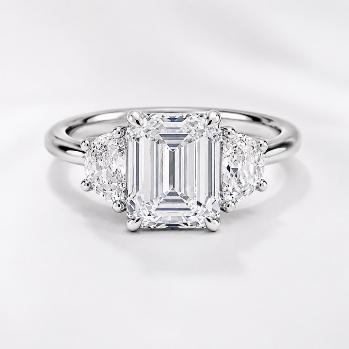 3 carat center stone emerald   EF  VS . With half moon shape diamond on side Excellent cut eye Clean stone IGI certified diamond ,engagement ring handcrafted made in 14k gold