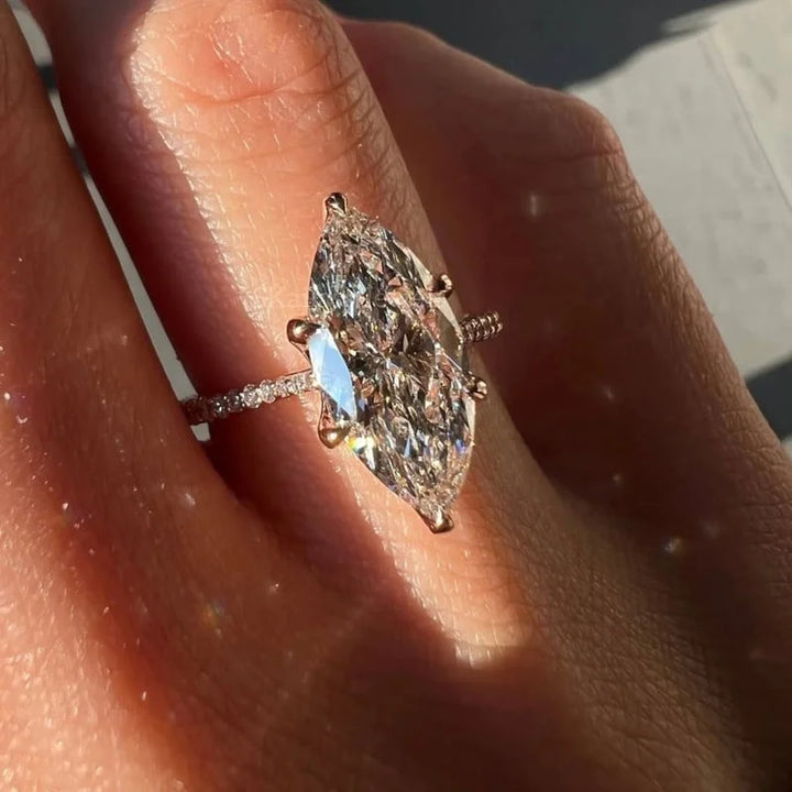 2 carat center stone marquise , engagement ring made in 14k gold ,