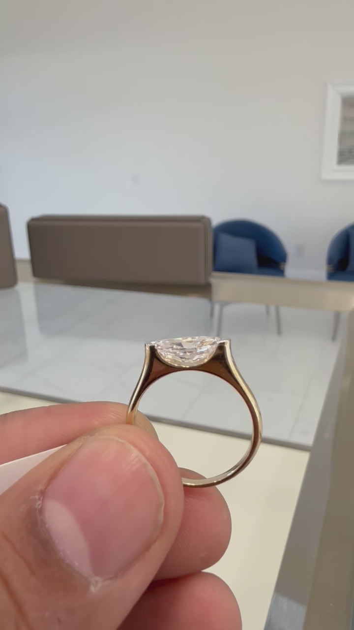 3 carat oval , VS elongated oval a special cut diamond made with 14k gold in igi certified diamond