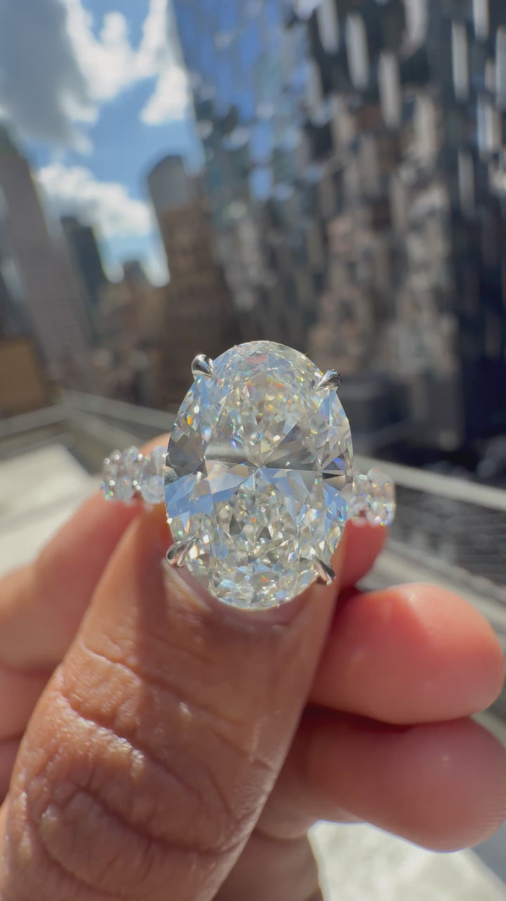 7 carat oval ring VS with 5 carat center stone IGI E vs certified with 2 carat side stones  center stone certified full engagement ring  with diamond handcrafted in grown diamond 14k gold ( made in gold ) iGI certified Diamond