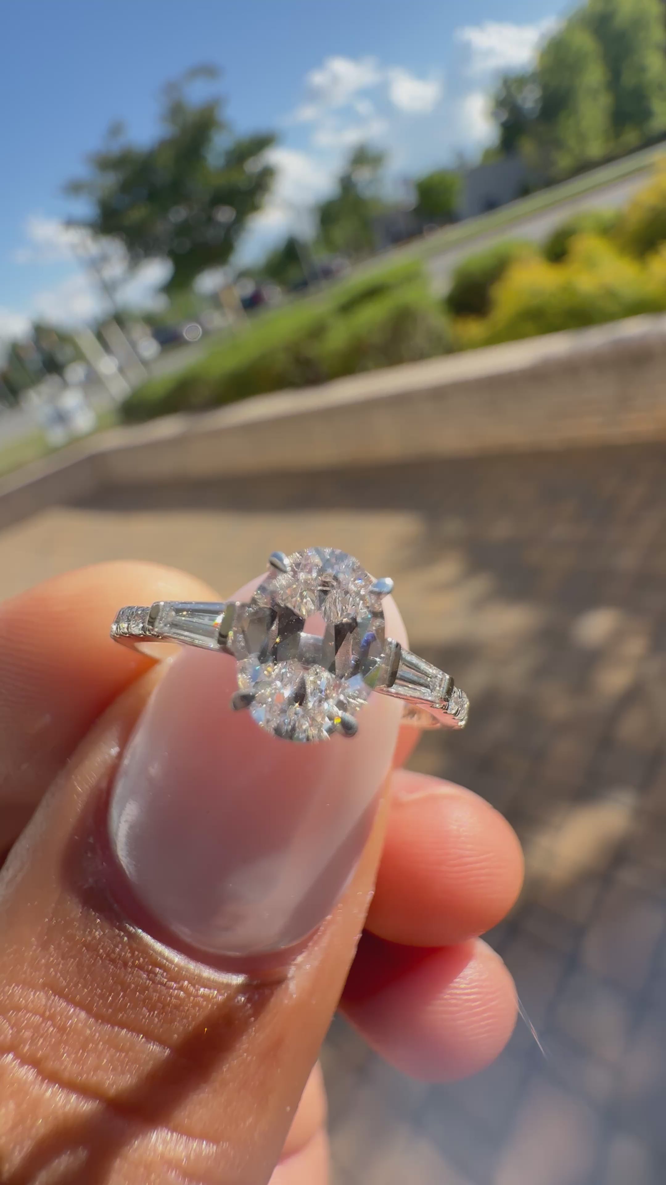 1.5 carat oval cut ring cut E vs IGI certified with special cut baguette on side highly handcrafted in grown diamond 14k gold