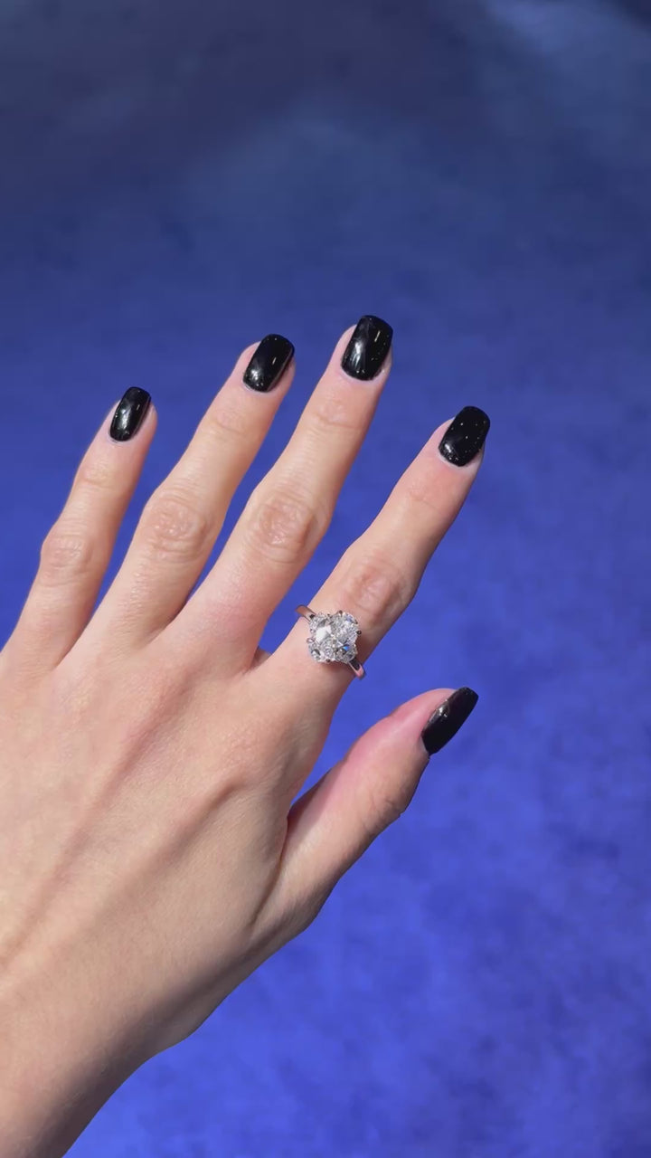 3 carat ring 2 carat center oval VS1 . Eye Clean stone IGI certified , select any shape you want , handcrafted in 14k gold